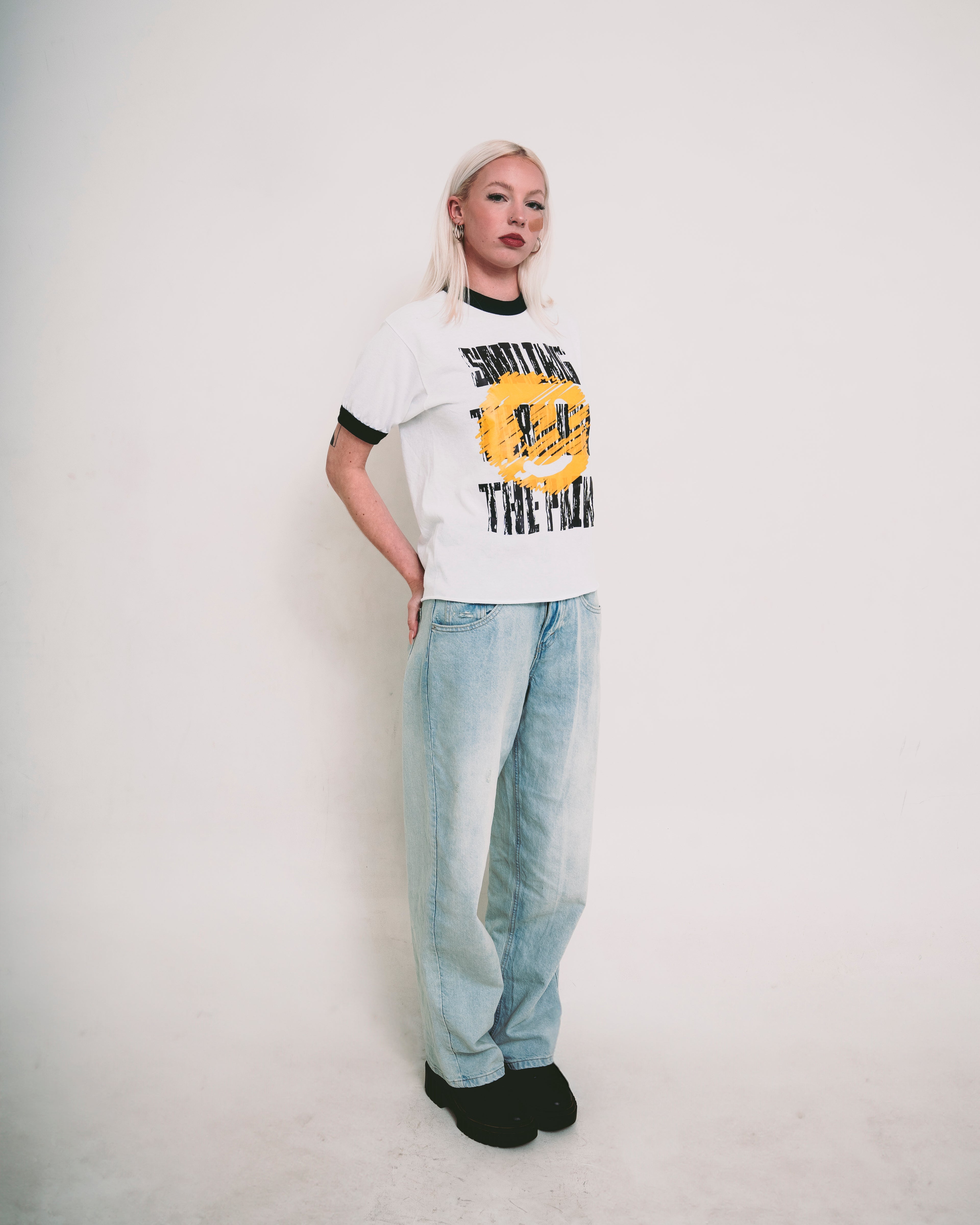 SMILING THROUGH THE PAIN ringer t-shirt